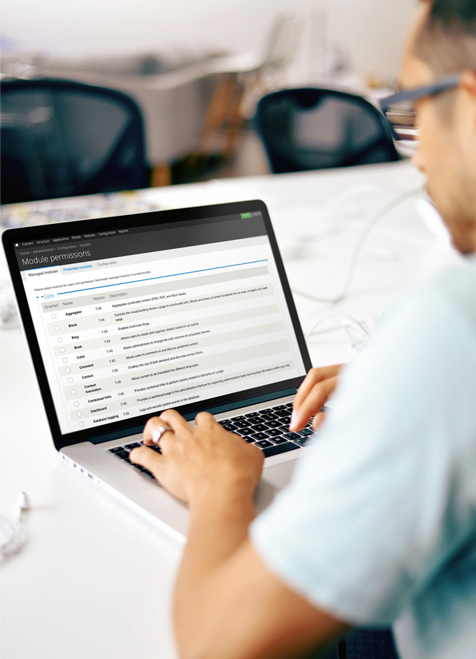 Digital marketing agency web developer updating module permissions in the back-end of a Drupal website