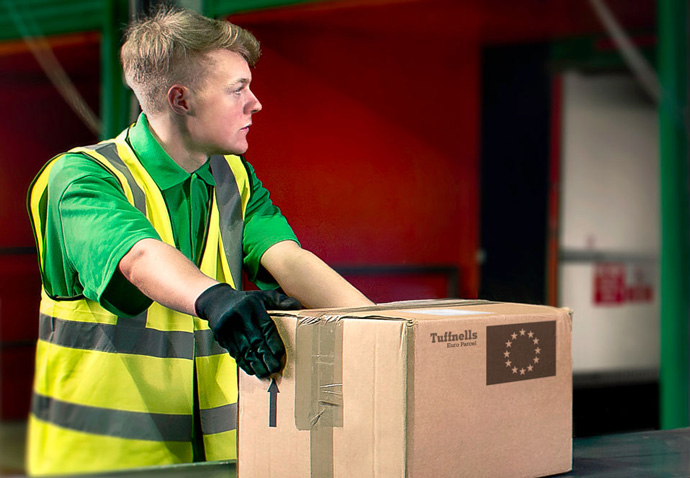 Retouched photograph of a Tuffnells warehouse worker created by intermedia for use on their new website