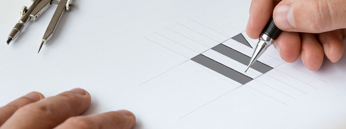 Branding agency designer sketching a new logo for a client